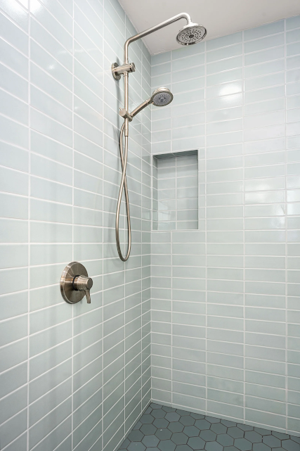 Walk-in shower with large-format or subway tile